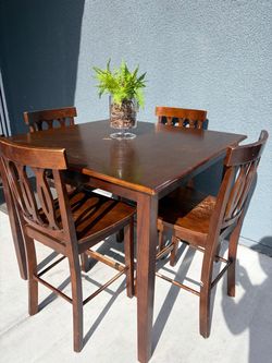 Tall table and 4 chairs