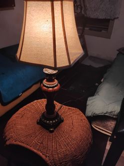 Traditional Table Lamp with Fabric shade and a hand woven coffee table with magazine holder