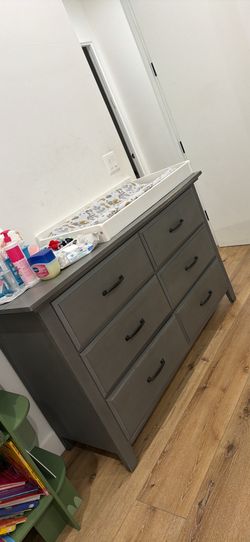 Dresser With Drawers And Baby Changing Table Area