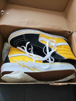 OBO Brand new pair of Vans Sk8-Hi Bolt sneakers in the vibrant Freesia yellow and black colorway.