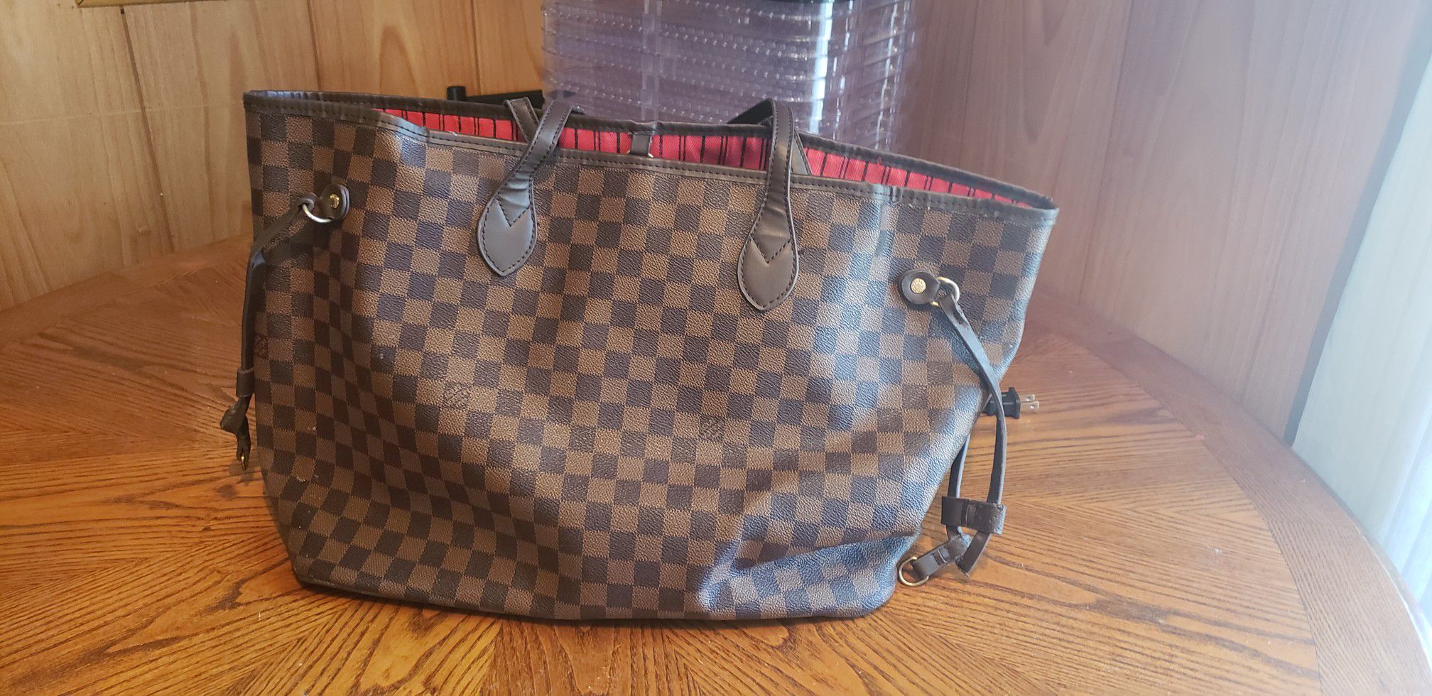 Louis Vuitton large hand bag originally 2,300$ as seen in the 3rd picture