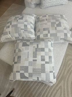 Three decorative pillows