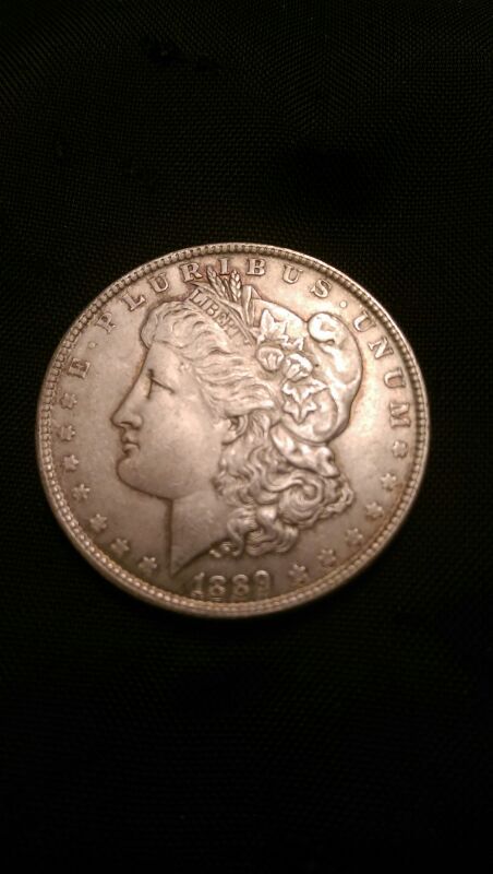 E. PLURIEUS UNUM 1889 Silver One Dollar Coin