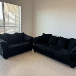 2 Ashley Furniture Black Couches