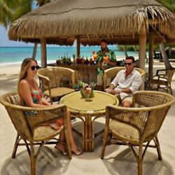 Set of 4 Vintage Rattan Chairs Tiki Boho Palm Beach Tropical Stacking eclectic rouge but functional

