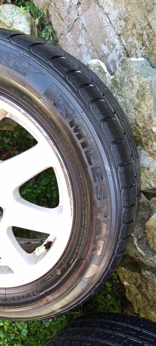 Lightly Used 15 In. Tires And oem Honda Rims