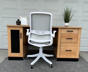 PENDING- Desk with chair and trash can.