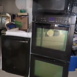 Three Black Appliances ( IN-WALL DOUBLE OVEN, DISHWASHER AND OVER RANGE MICROWAVE) For Sale