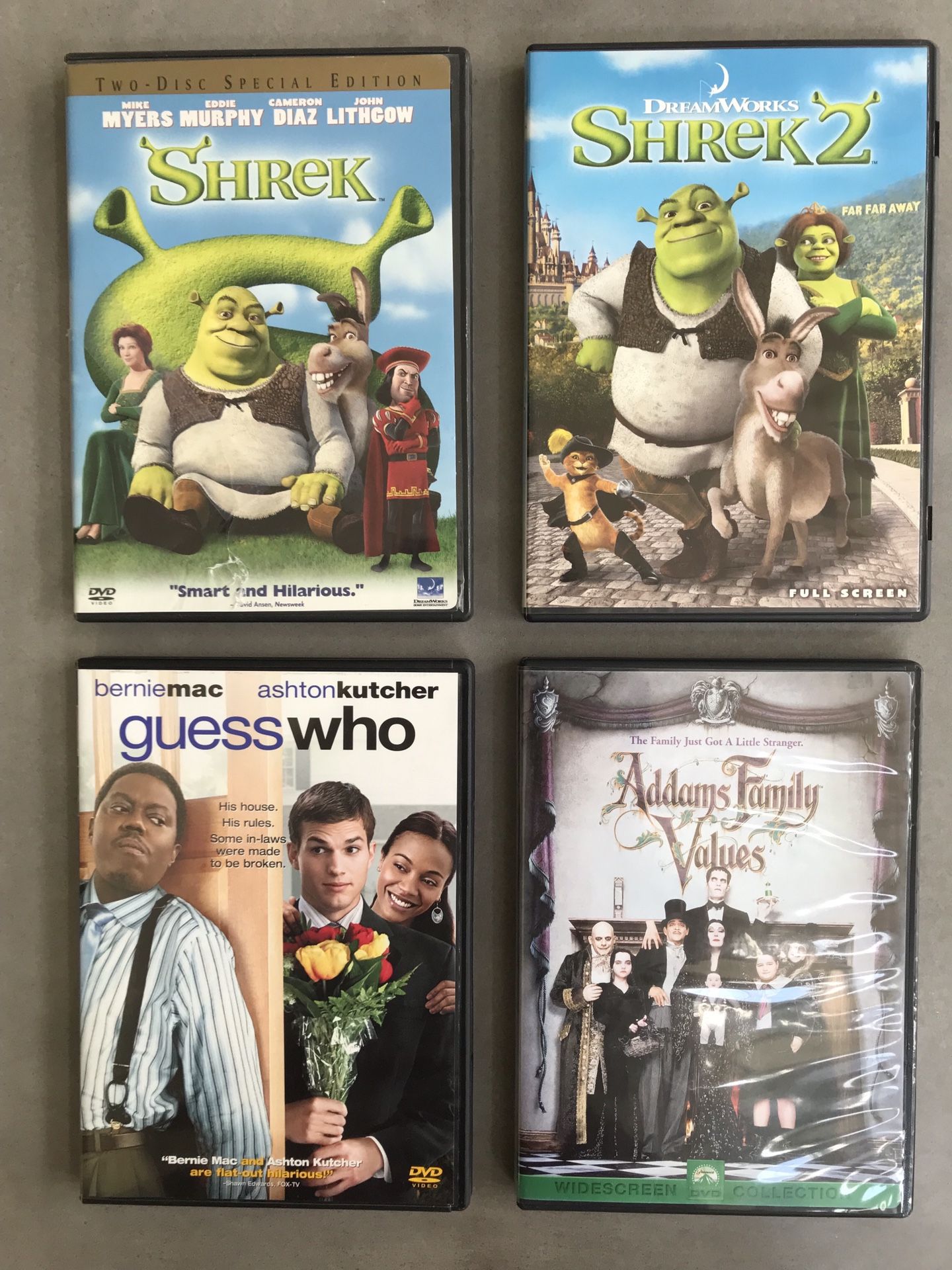 4 kids DVDs including Shrek and Shrek 2