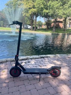 Hopcycle e scooter max speed 25mph and 21 miles rear suspension