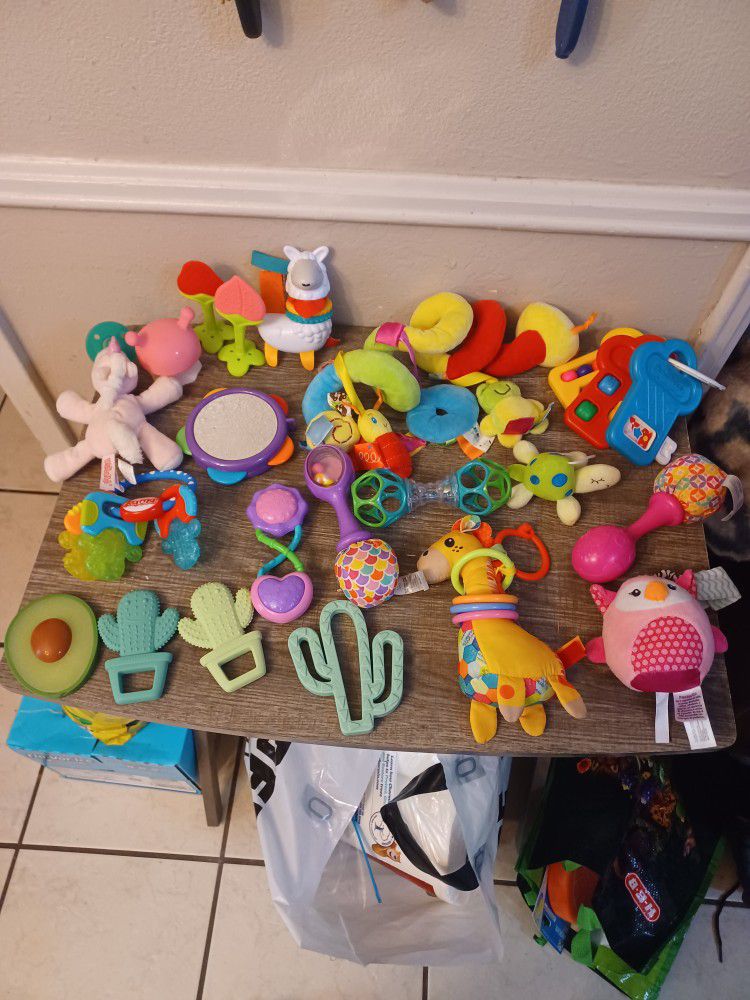 Infant Bundle. Rattles Teethers Ect. Some New