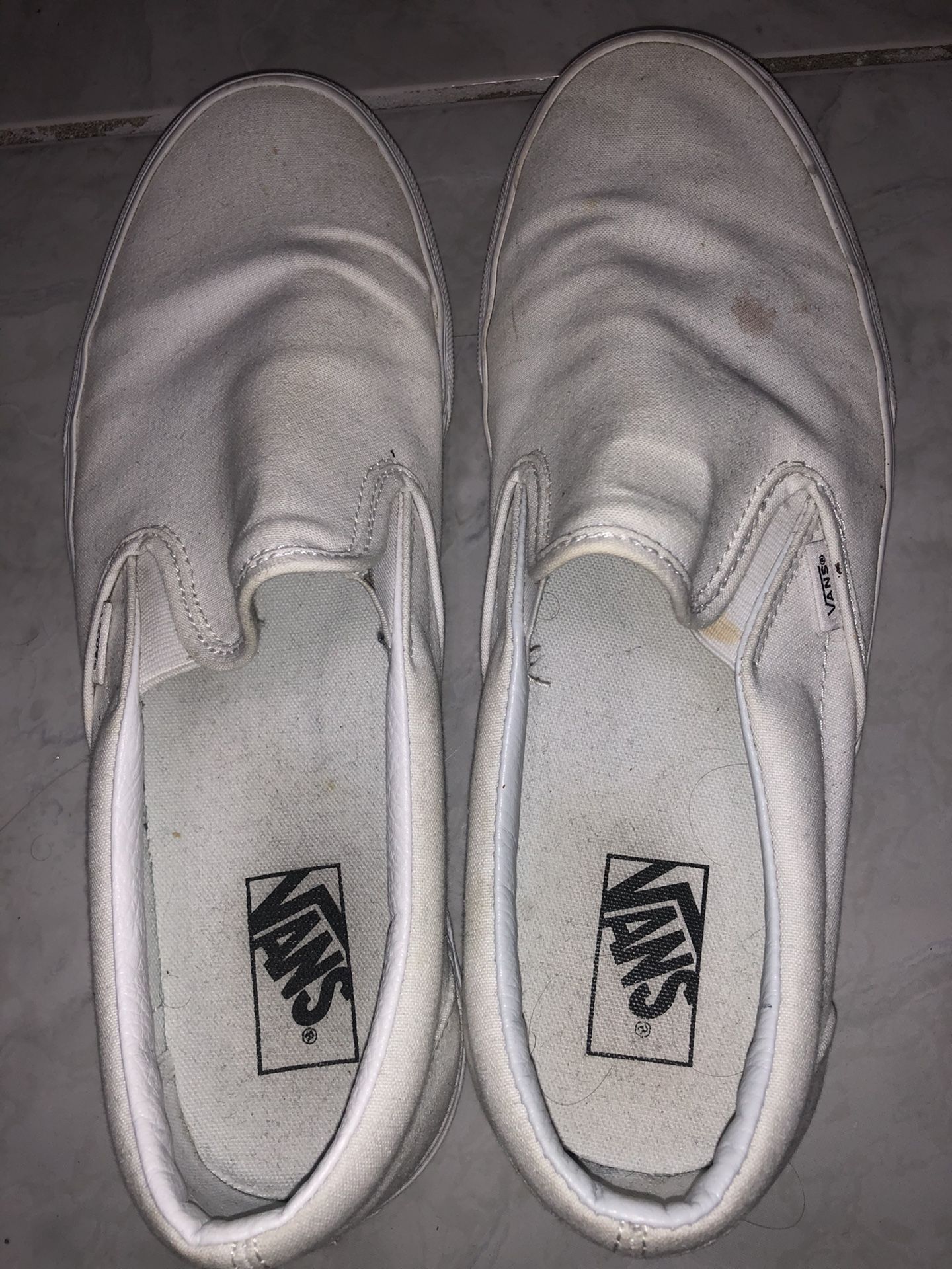 Men’s White Vans slip ons