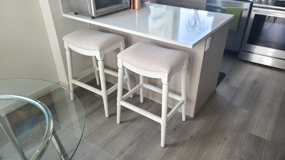 Upholstered white stools, for breakfast table or nook or high table