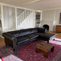 Black leather Chesterfield Sectional Couch