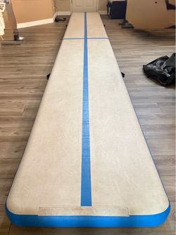 Murtisol airtrack for gymnastics. 27 feet long, width is 3.3ft and Thicknesses is 6 inches. Comes with storage bag and air pump. Cash only. No el