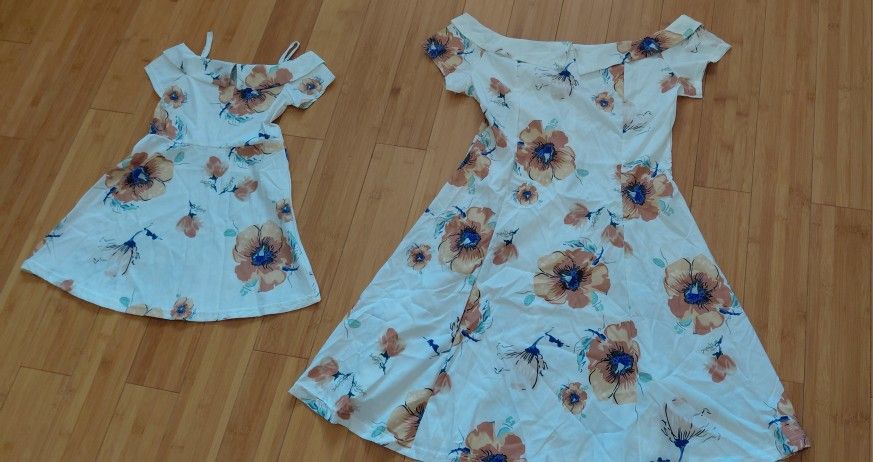 Matching dresses for sisters or mother and daughter. 3/4 years old and one size Medium both$8