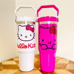 2 NEW Hello Kitty 30oz Tumbler.Double wall Stainless Cup keeps cold and hot drinks. Flip straw and hand carry handle.   FEATURES: Double-wall vacuum i