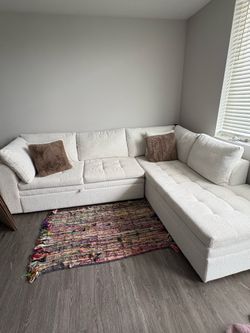 Off white L Shaped Couch WITH pull out bed