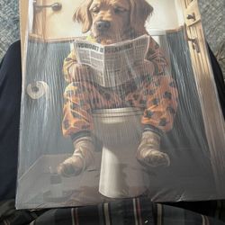 Canvas pic of dog reading newspaper on toilet 