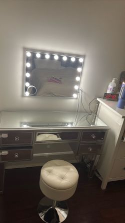 Vanity with mirror and stool