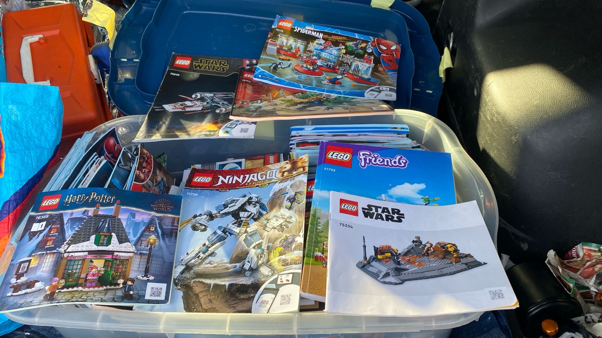 Tote full of lego manuals / very collectible