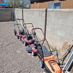 Three Gas Lawn Mowers In Good Condition But They All Need To Pull String And They Were Running Great Before $40 For All Three And An Electric One $50 