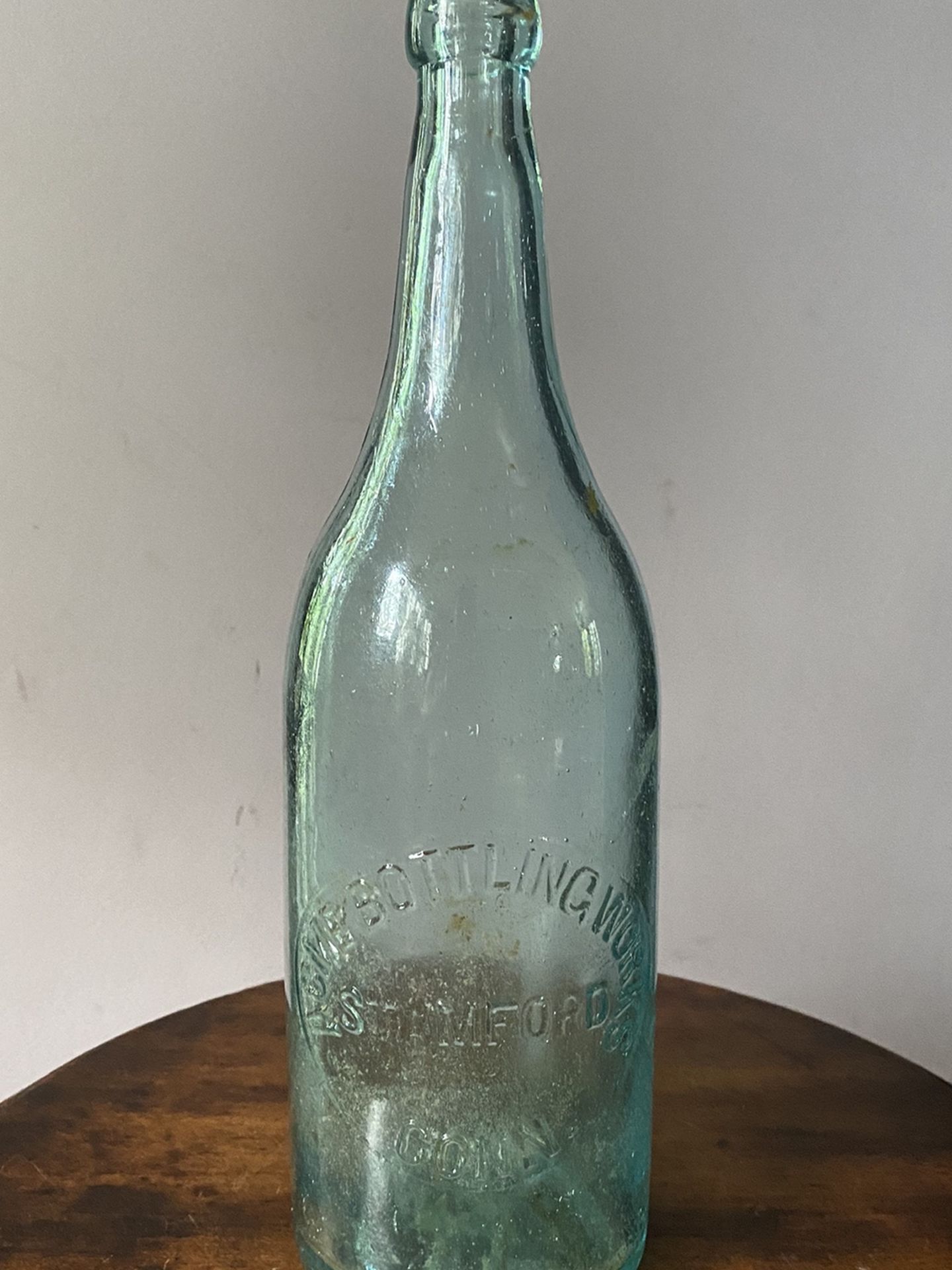 Vintage Acme green bottle. “Acme Bottling Works Stamford Conn.” 