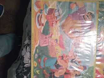 2 puzzles from Popeye and Olive and Brutus and sweet pea and wimpy all pieces are there both 1970s