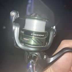 Shimano C3000HG SETUP WITH ROD AND SPOOL FULL OF BRAIDED LINE