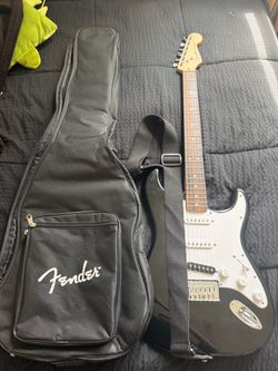 Squier Stratocaster with backpack