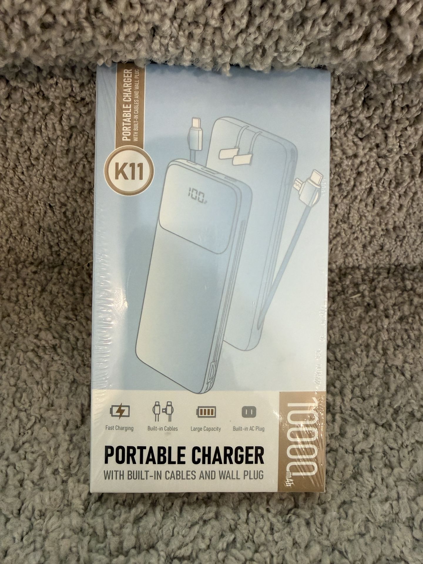 Brand new portable charger 10000mAh power bank with built in cables and wall plug 