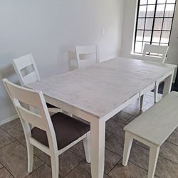 Dining table with 4 chairs and a bench table with leaf