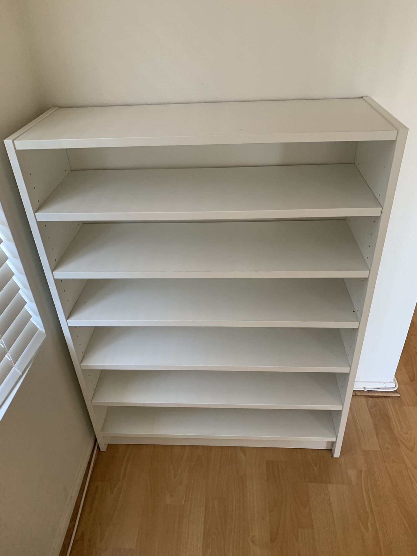 IKEA shelf with 3 extra shelves white can use for shoe rack excellent condition
