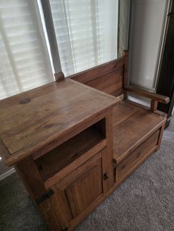 Rustic gossip bench with storage