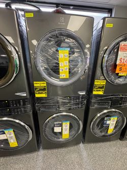 Graphite Electrolux Washer 4.5 cu ft and 8.0 cu ft Electric Dryer Stacked Set. Units are new open box scratch and dent