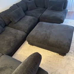 Arliz 7 - Piece 144” Wide Reversible Modular Corner Section With Ottoman 