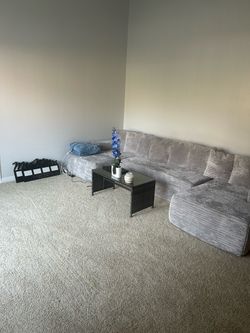 Gray three piece boneless sofa