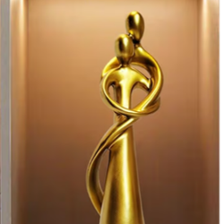 Gold couples sculpture