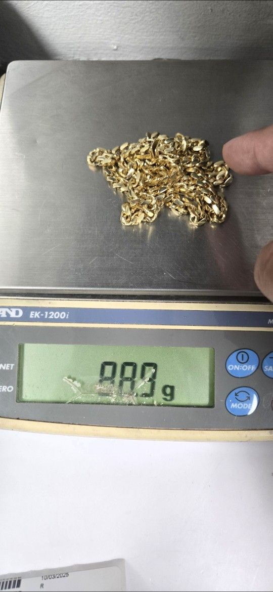 14kt 24.5in. 88.9 Grams Cuban Link....