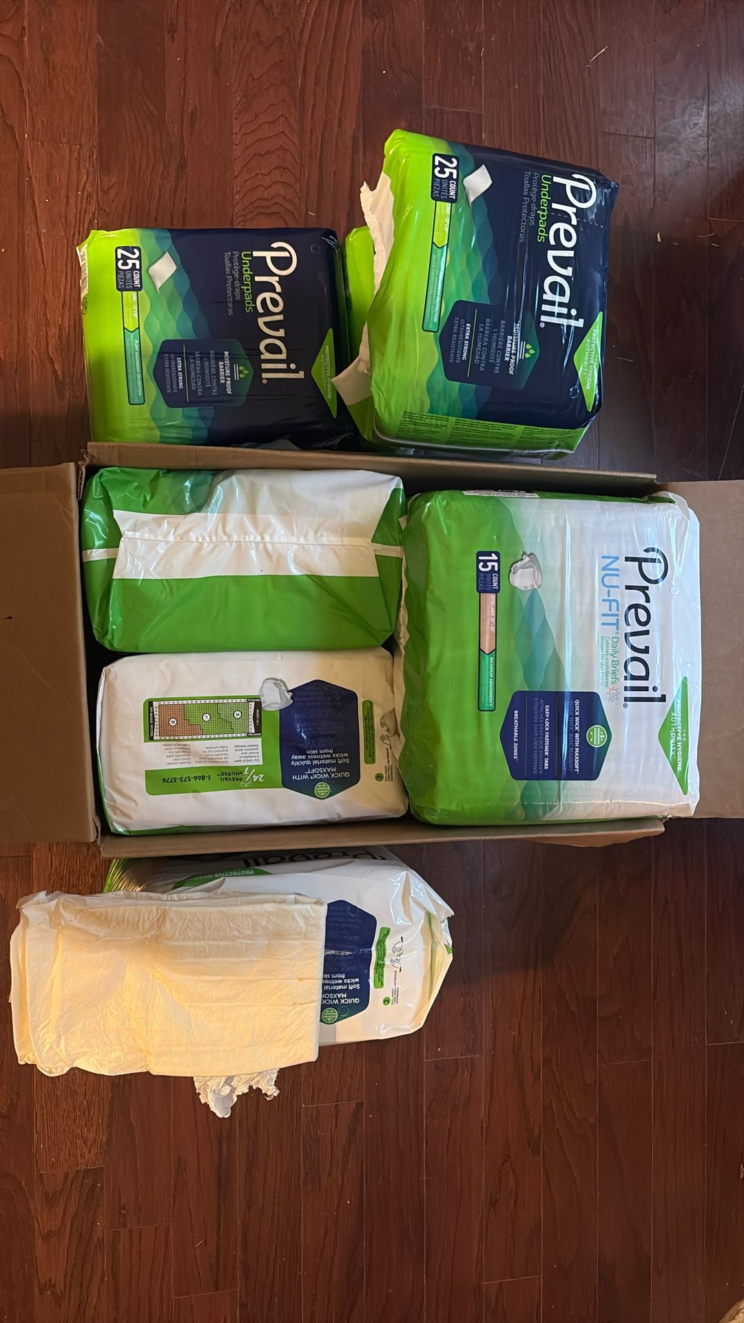Bondle Of Under Pads/NU-Fit Prevail