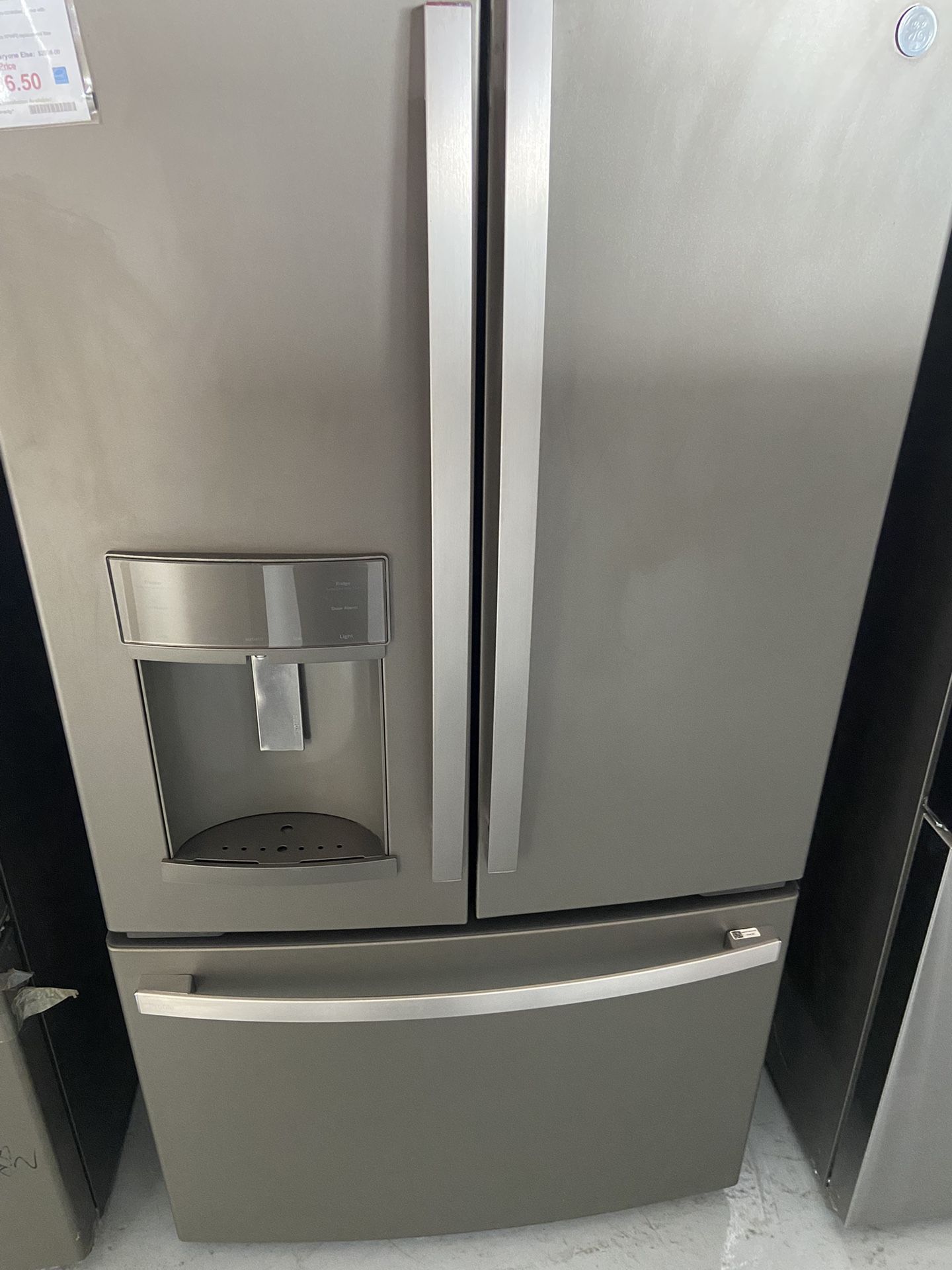 Open box, GE profile series energy star, 27.7 ft.³ French door refrigerator with hands-free auto fill.