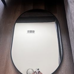 Black Rimmed Oval Mirror
