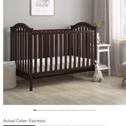 Used Crib + Mattress In Plastic $30