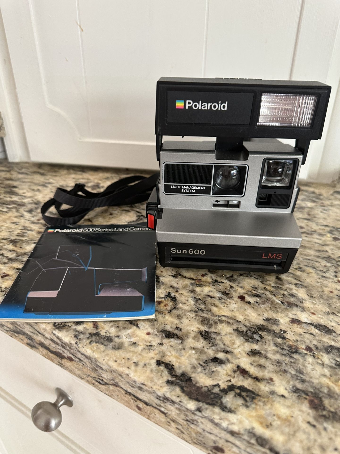 Polaroid Sun 600 Camera complete with Manual