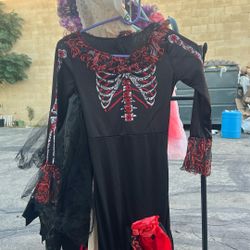 The de los Muertos costume it’s pretty nice longsleeve they got fluffy in the bottom rose