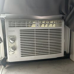 Frigidaire air Conditioner, Couch/futon, And Coffee Table For Sale 