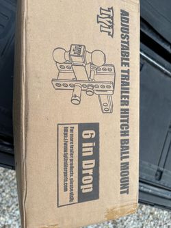 A 2 inch towing hitch 2 5/16” ball and a 2” ball