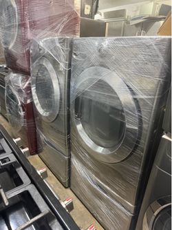LG front load set stainless steel with pedestal