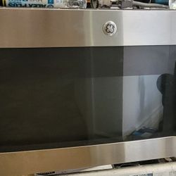 GE Top Range Microwave-Good Condition 