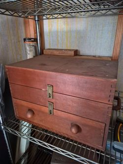 Wooden furnished homemade toolbox.